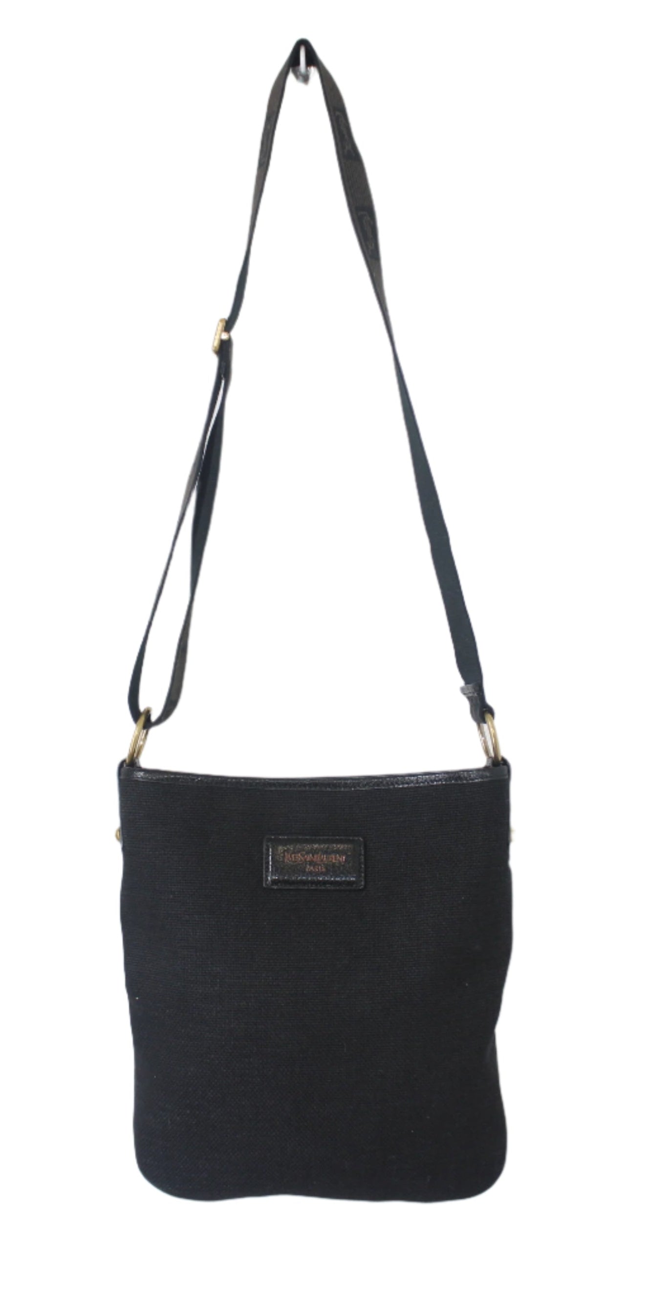 Black shoulder bag with a strap on a white background