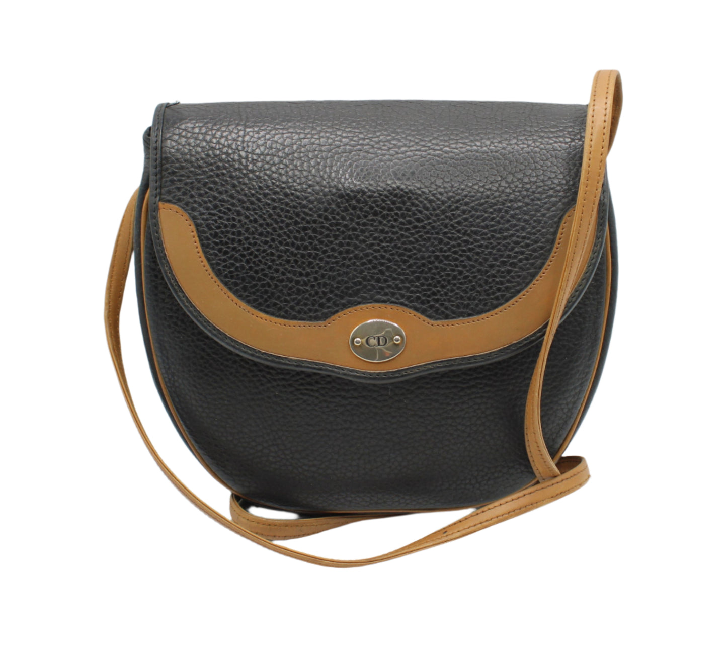 Christian Dior Black Pebbled Leather Flap Crossbody Bag Black leather handbag with brown strap on a white background