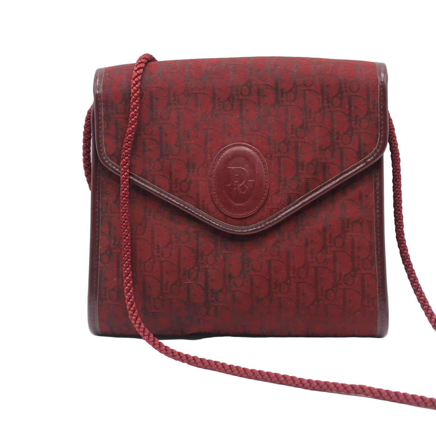 Christian Dior Burgundy Trotter Crossbody Bag Cloth Strap Red handbag with a patterned design on a white background