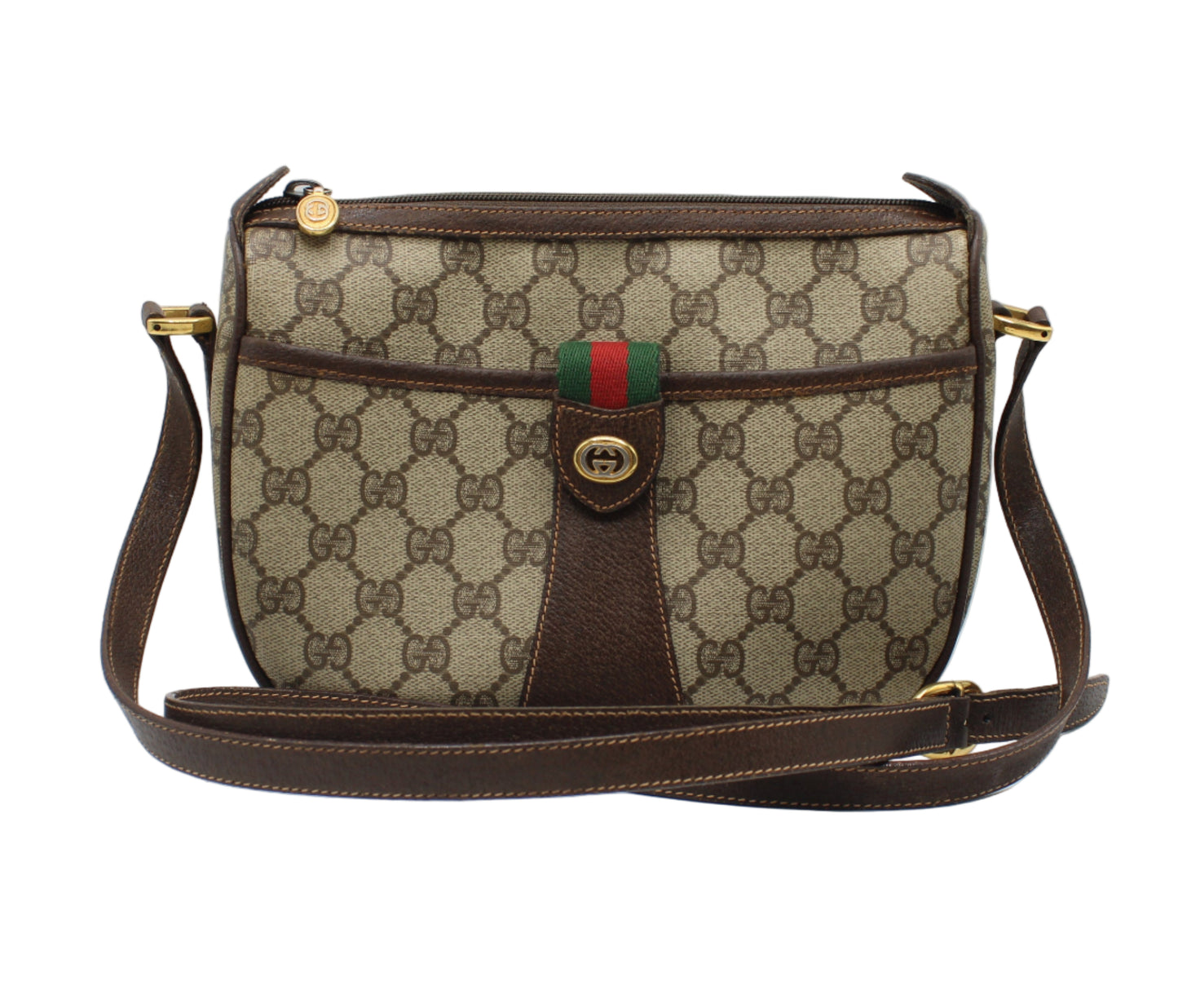 Gucci Brown GG Supreme Canvas Leather Trim Crossbody Bag Designer handbag with patterned fabric and brown leather accents on a white background