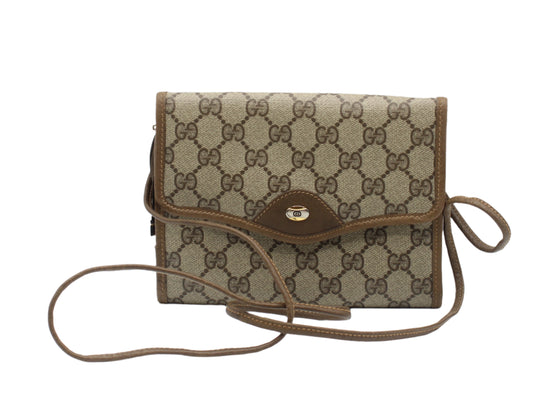 Gucci Brown Monogram Coated Canvas Leather Crossbody Bag Brown patterned handbag with a strap on a white background