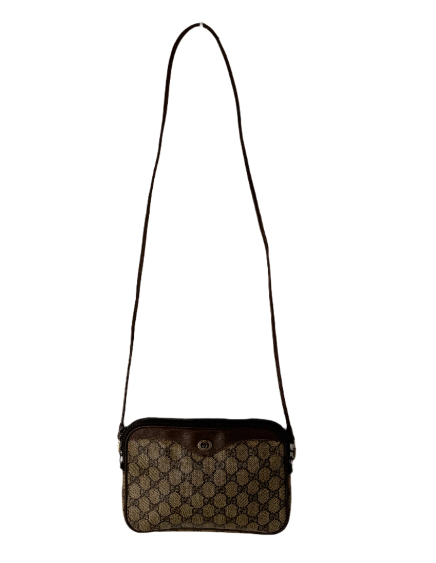 Black handbag with a pattern on a light gray background