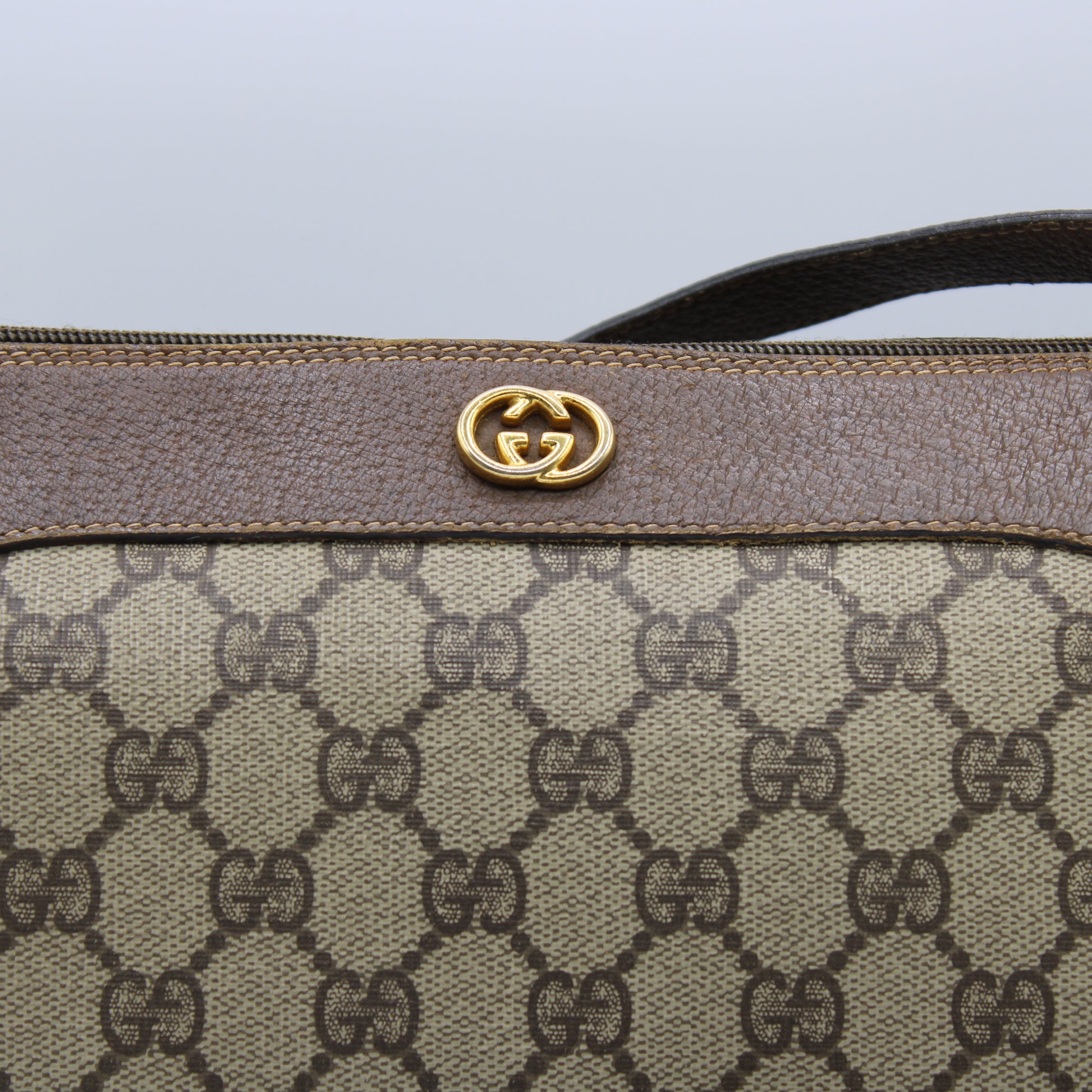 Gucci Petite Brown GG Supreme Monogram Crossbody Bag close up