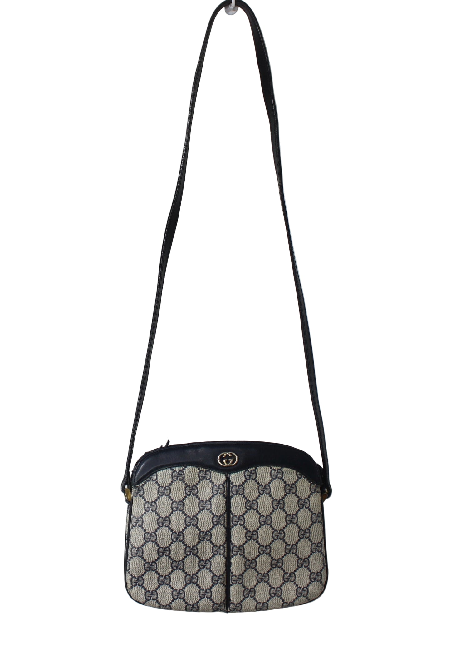 Patterned crossbody bag with a visible brand logo on a white background