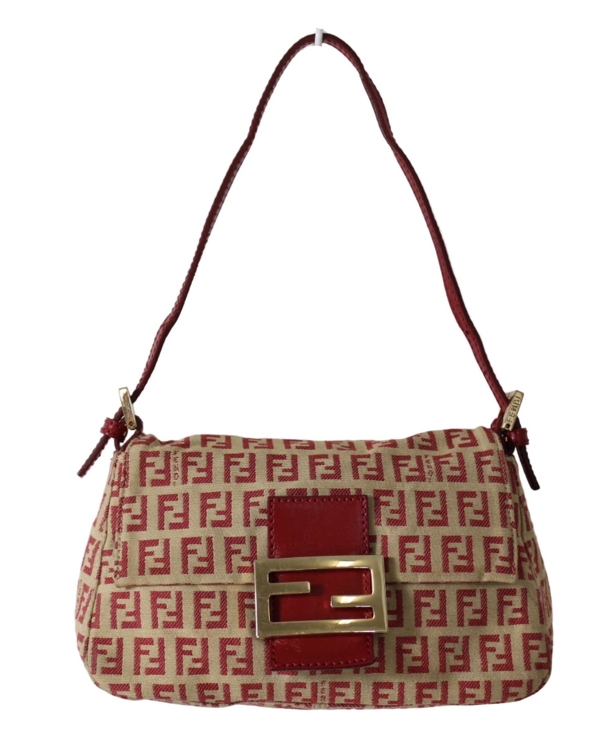Designer handbag with red and beige pattern on a white background