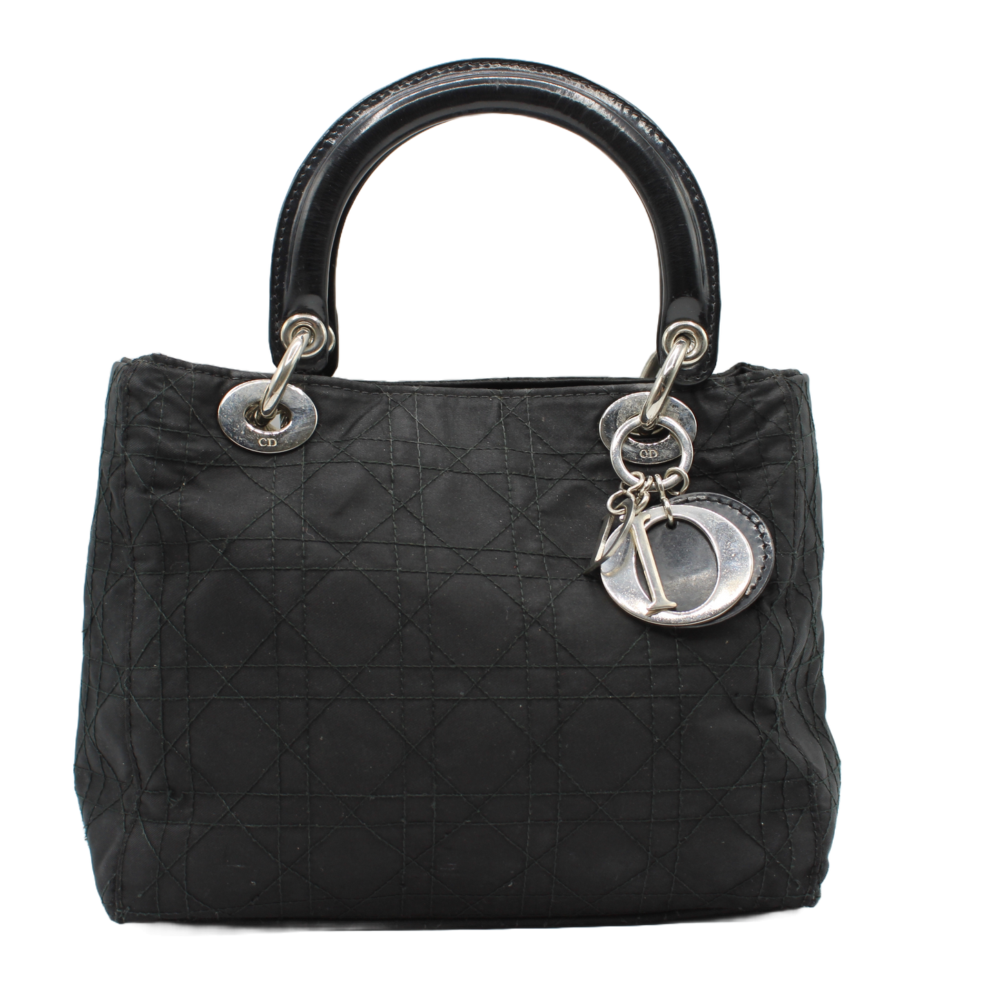 Christian Dior Black Canvas Cannage Lady Dior Handbag Black quilted handbag with silver hardware on a white background