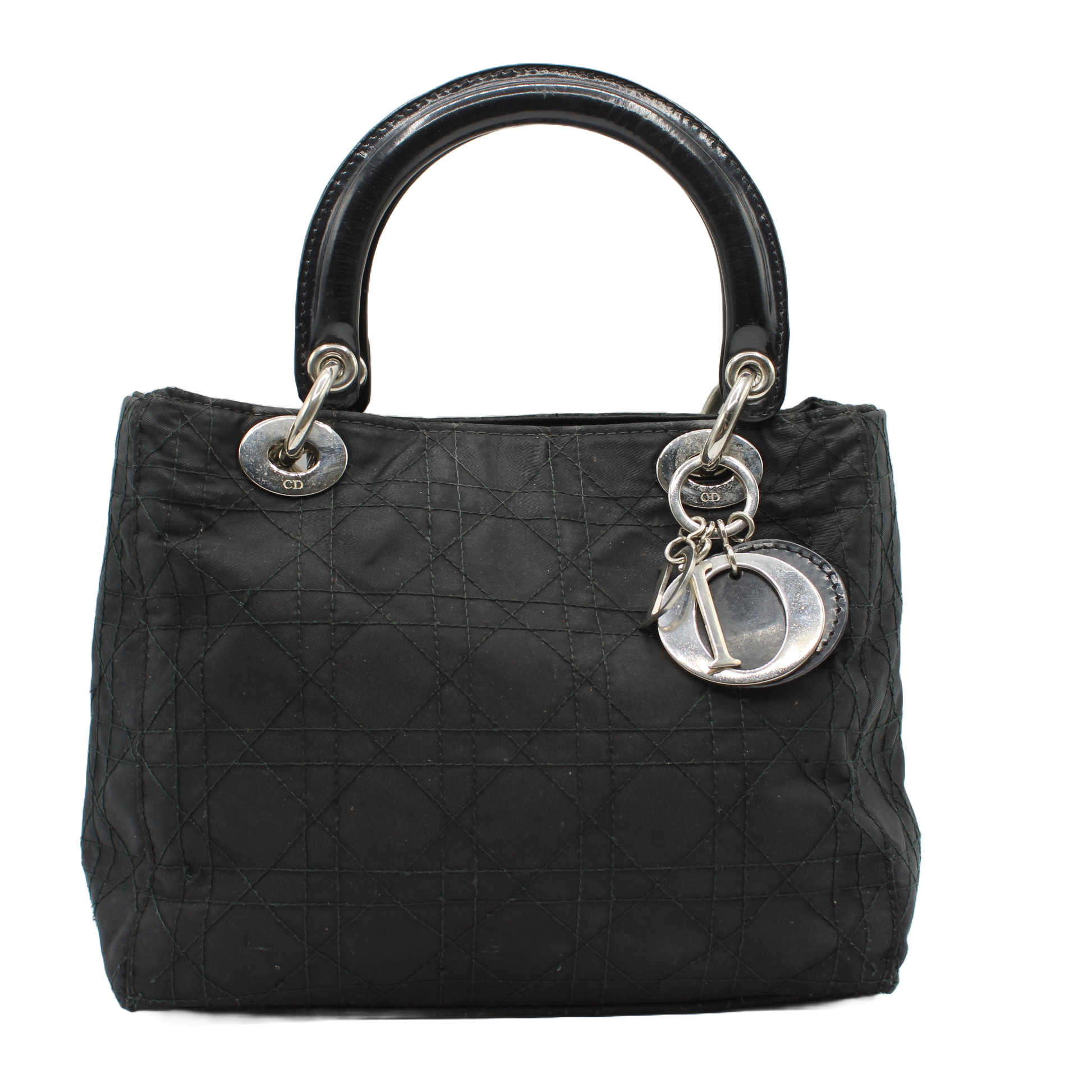 Christian Dior Black Canvas Cannage Lady Dior Handbag Black quilted handbag with silver hardware on a white background