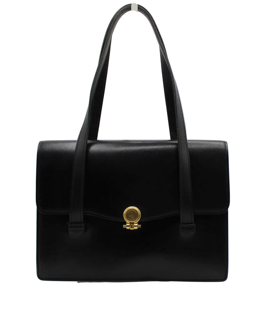 Christian Dior Black Leather Classic Shoulder Handbag Black handbag with a gold clasp on a white background