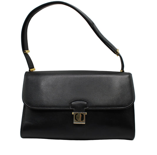 Christian Dior Black Leather Gold CD Clasp Shoulder Bag Black handbag with a gold clasp on a light gray background