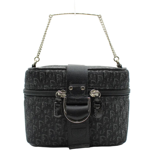 Christian Dior Black Logo Print Vanity Chain Bag Black patterned handbag with gold chain strap on a white background
