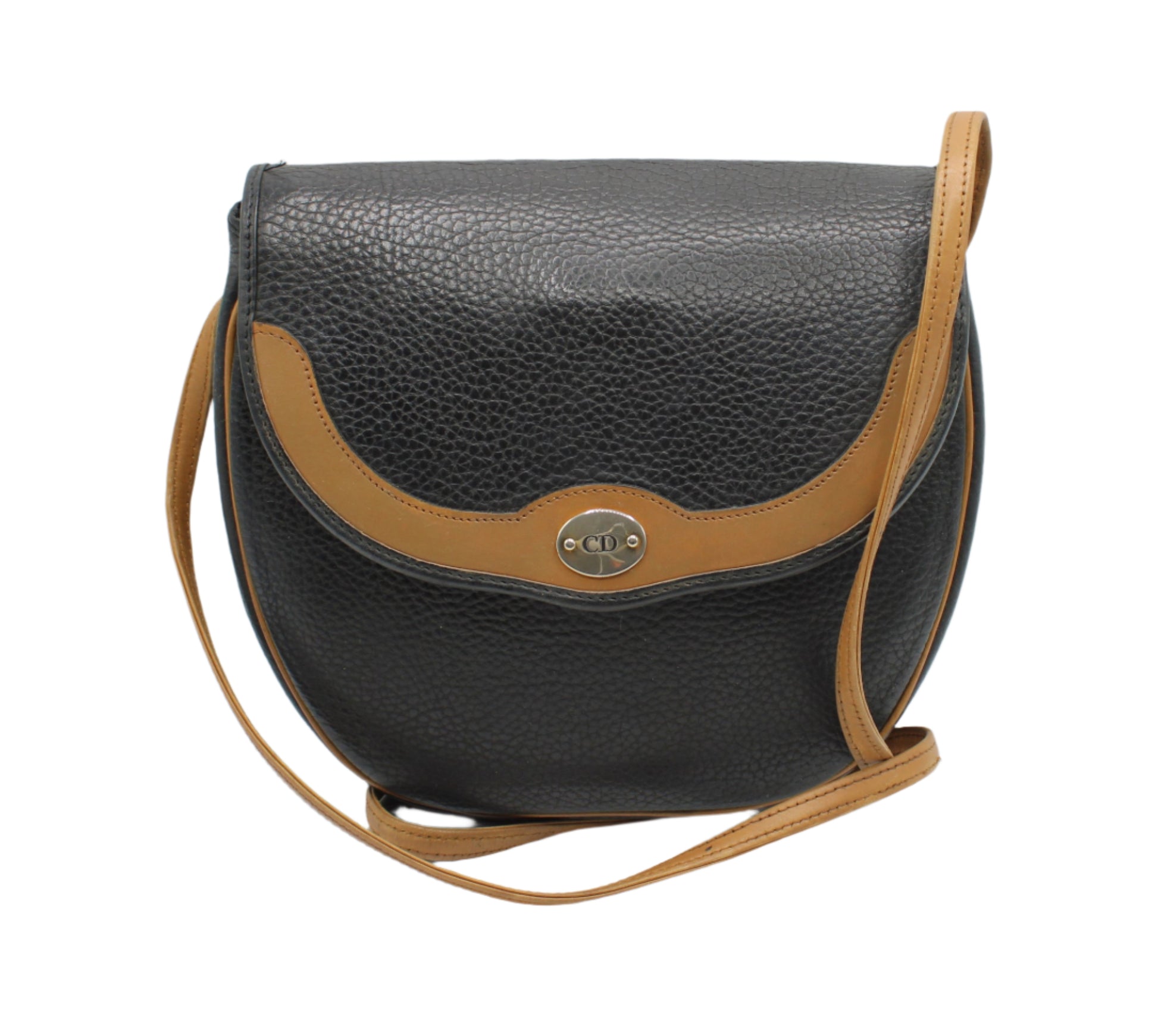 Christian Dior Black Pebbled Leather Flap Crossbody Bag Black leather handbag with brown strap on a white background