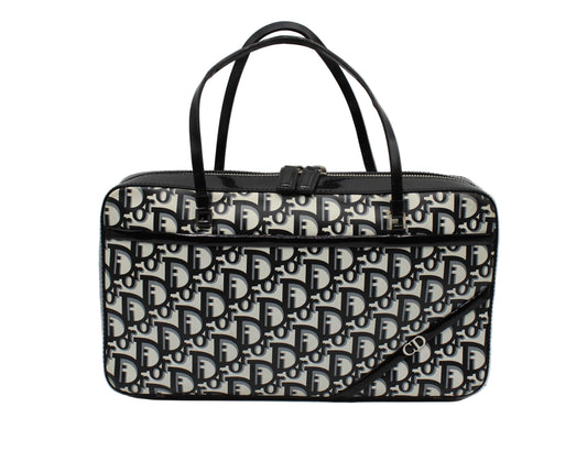 Christian Dior Black White Monogram Patent Leather Flat Boston Bag Black and white patterned handbag on a light gray background
