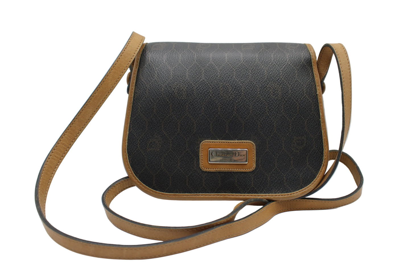 Christian Dior Brown Honeycomb Canvas Leather Crossbody Bag Black handbag with brown strap on a white background