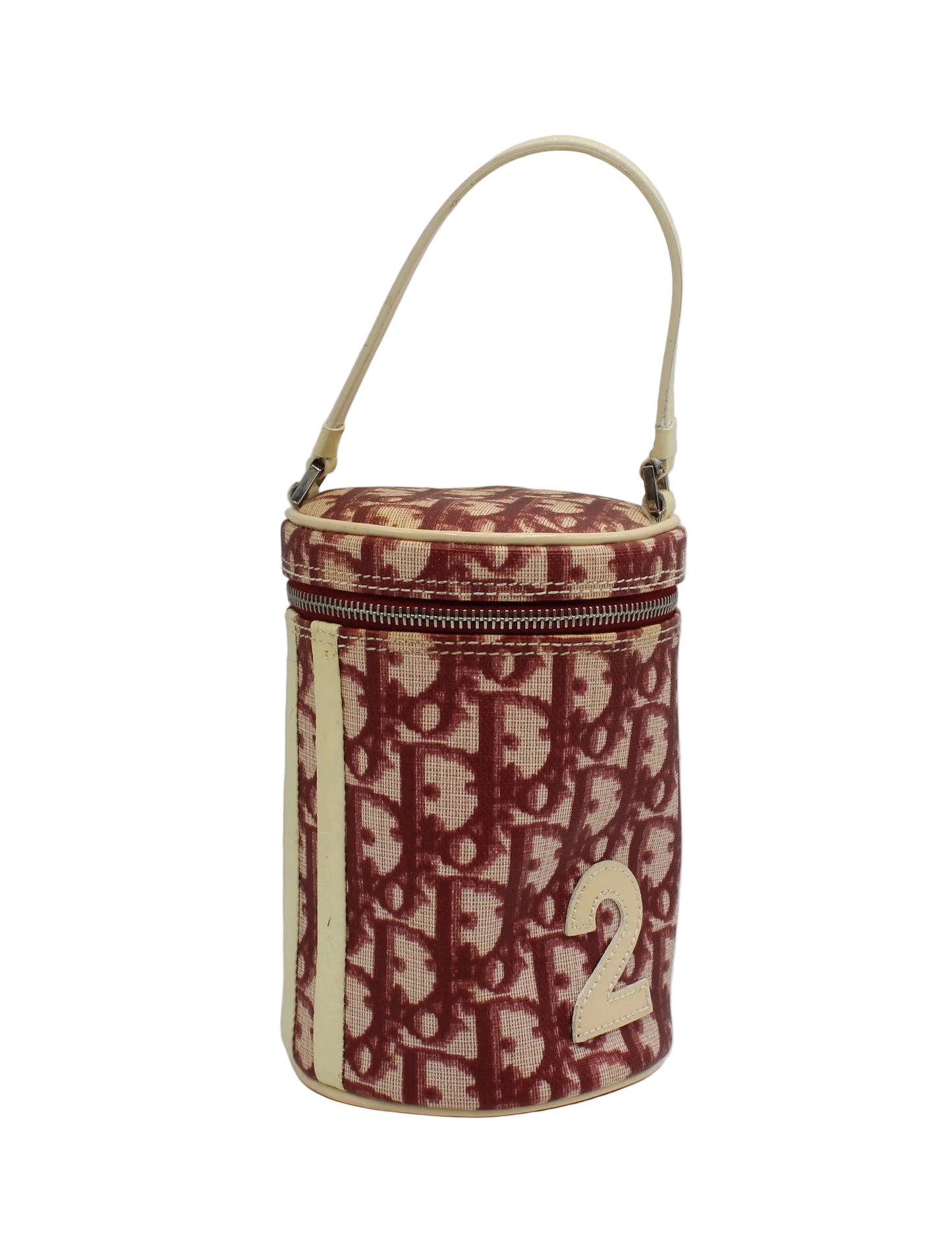 Christian Dior Burgundy Oblique Canvas Number 2 Cylindrical Vanity Handbag Red and beige patterned cylindrical bag with a visible brand logo on a white background