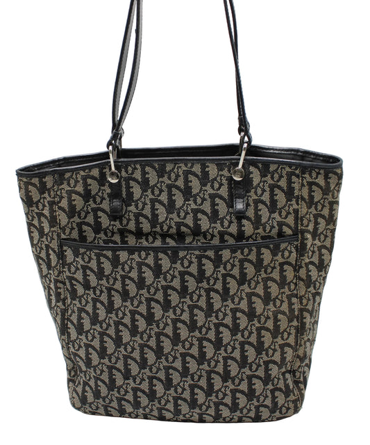  Christian Dior Navy Canvas Trotter Tote Bag Patterned handbag with black handles on a white background