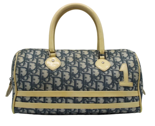 Christian Dior Navy White Oblique Canvas Boston Bag Designer handbag with visible brand logo on a gray background