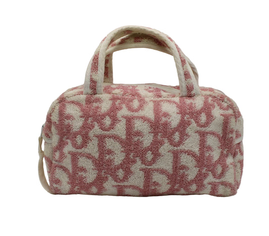 Christian Dior Pink Terry Cloth Logo Hand Bag Small handbag with a red and white pattern on a light gray background