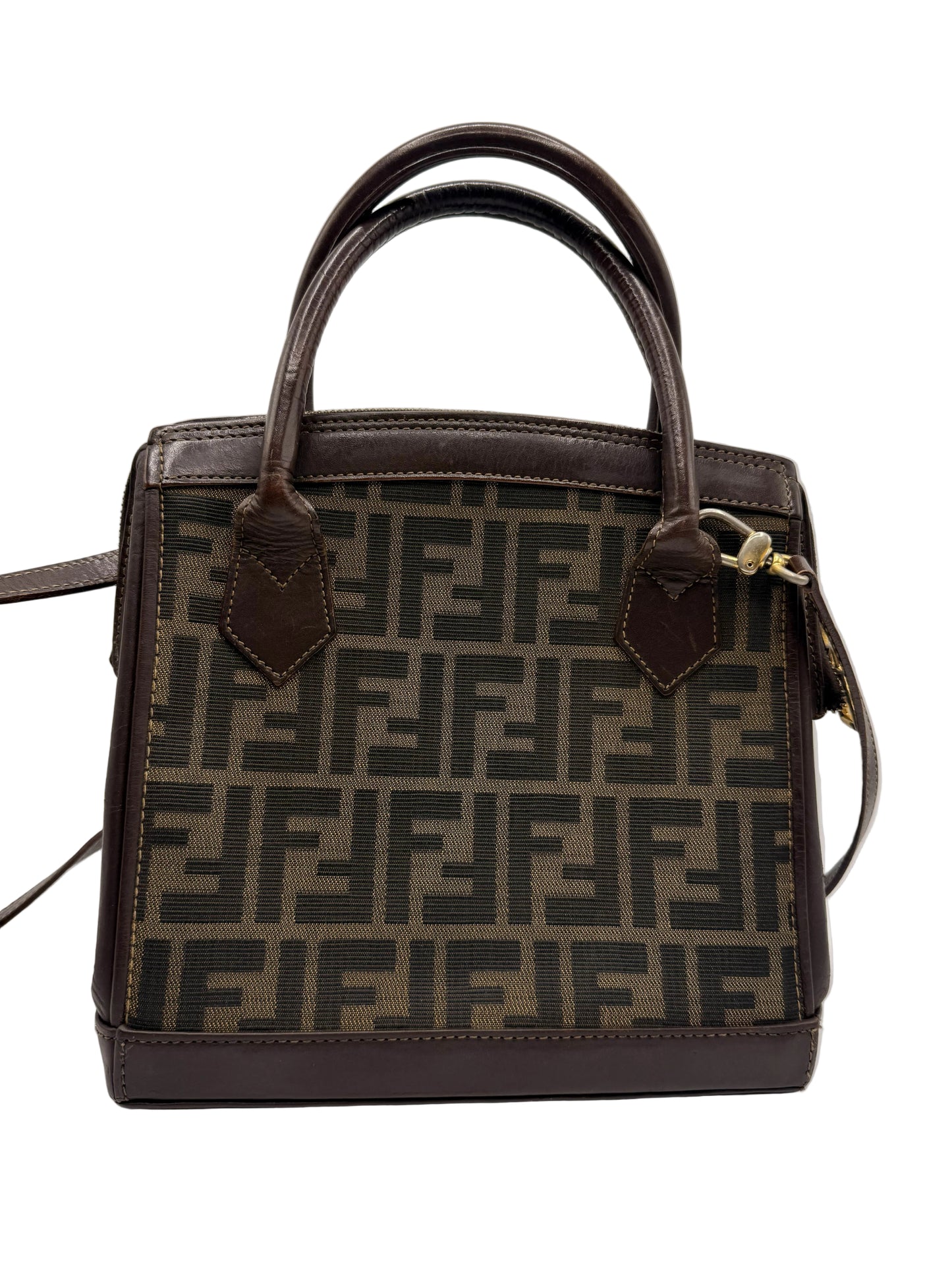 Fendi Brown Zucca Canvas Leather Tote Bag A Fendi handbag in the signature Zucca monogram canvas with dark brown leather trim and handles, shown against a plain light gray background.
