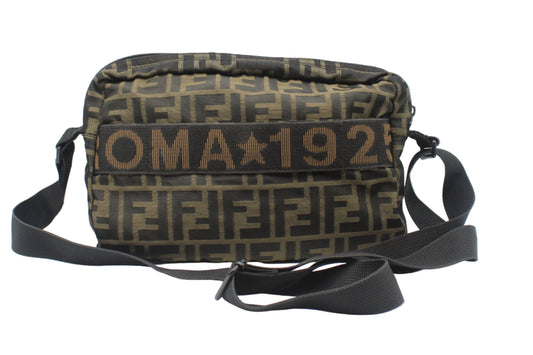  Fendi Brown Zucca Print Roma 1925 Crossbody Bag Patterned bag with visible branding on a white background