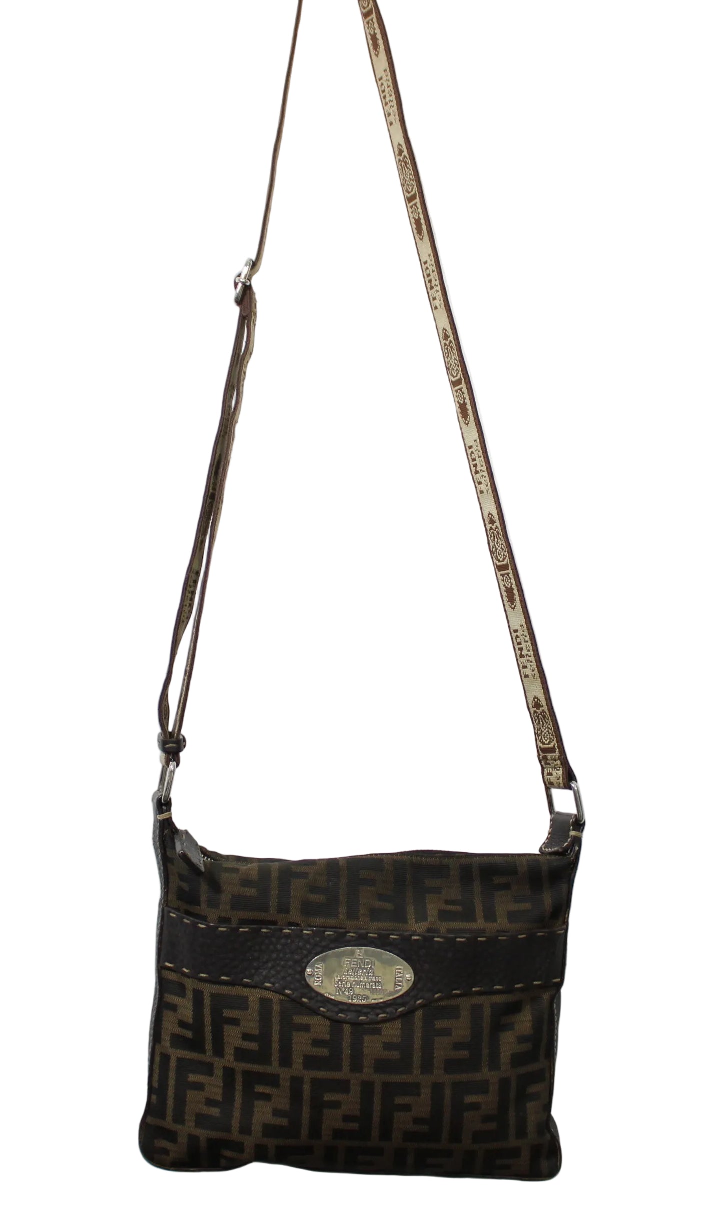 Brown patterned shoulder bag on a white background