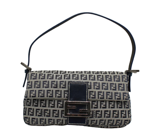 Fendi Navy Zucca Canvas Leather Baguette Shoulder Bag Patterned handbag with a prominent logo on a white background