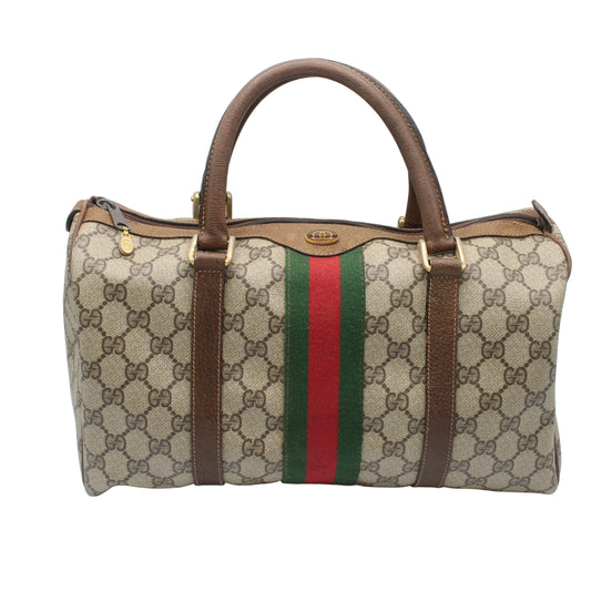  Gucci Beige Brown GG Canvas Green Red Stripe Boston Bag Designer handbag with brown handles and a red and green stripe on a white background