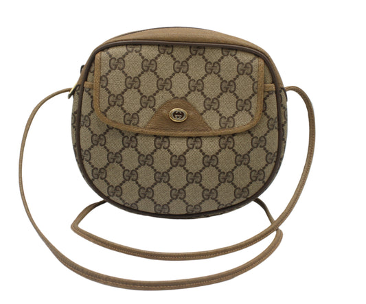 Gucci Beige GG Canvas Leather Trim Crossbody Bag Brown Gucci handbag with patterned design on a white background