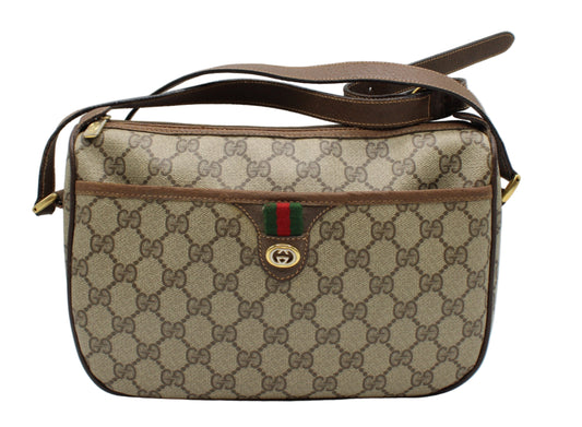 Gucci Brown GG Supreme Canvas Ophidia Leather Crossbody Bag Beige Gucci handbag with brown strap on a white background