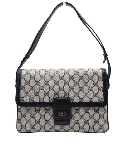 Gucci Navy GG Canvas Leather Flap Shoulder Bag Designer handbag with patterned fabric and black accents on a white background