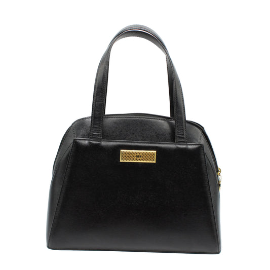 Black handbag with a gold clasp on a white background