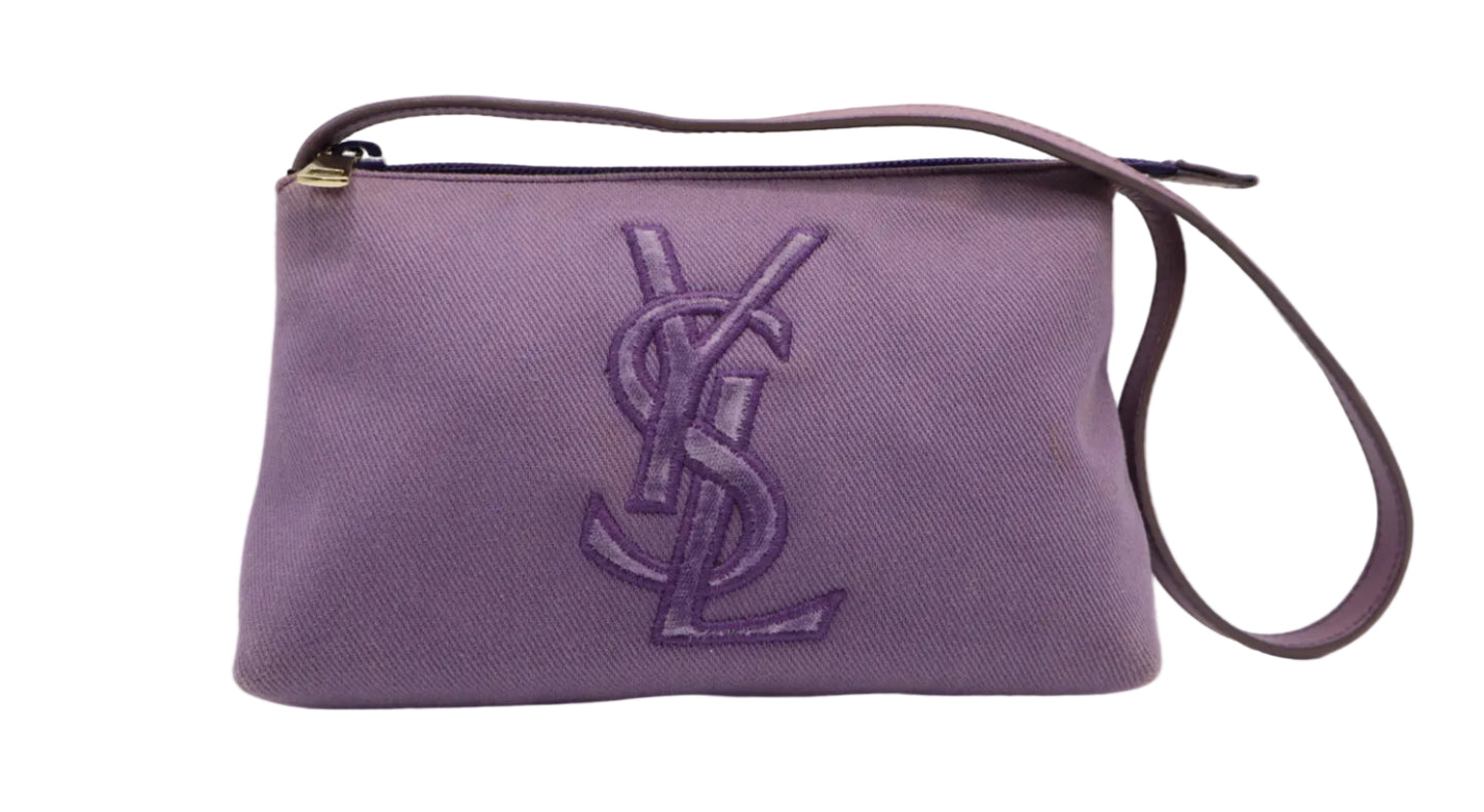 Yves Saint Laurent Purple Canvas Velvet Logo Shoulder Bag A purple Saint Laurent shoulder bag made of textured canvas with an embossed YSL logo on the front, featuring a matching purple leather strap and gold zipper pull.