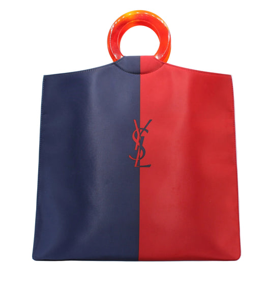 Yves Saint Laurent Red Blue Cloth Tote Bag Two-toned blue and red handbag with a visible brand logo on a white background